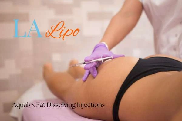 Woman having fat dissolving injections Custom House on thighs