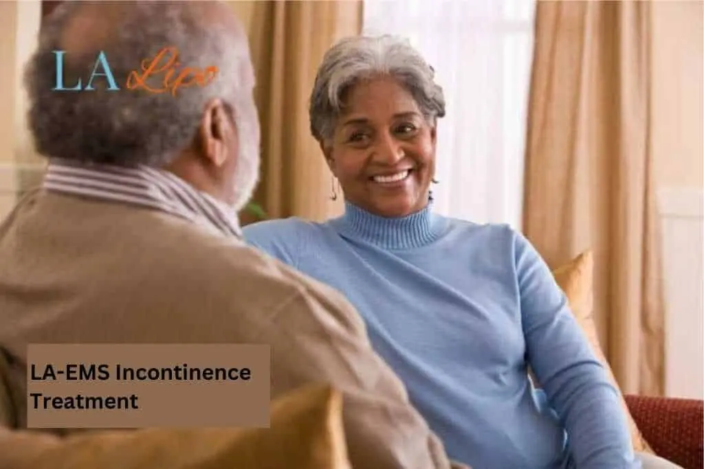 Couple sat smiling at each other - LA-EMS treatment Custom House
