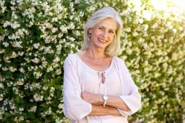 Older woman happy with urinary incontinence treatment Custom House